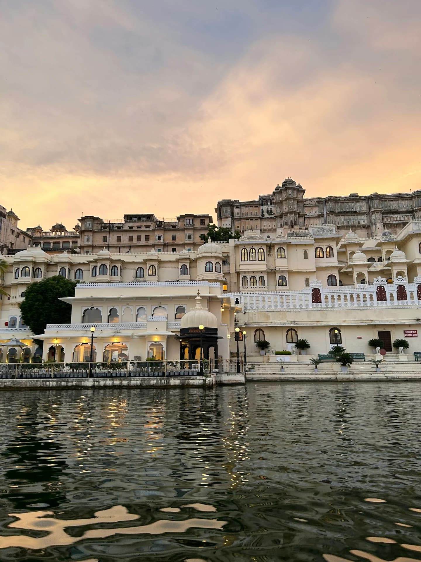 City Palace and Lake Pichola in Udaipur at golden hour